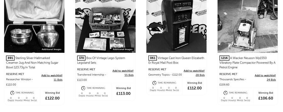 The Badgers Auctions results grid running on UBERHAMMER: lot cards with reserve met, winning bid and bid count